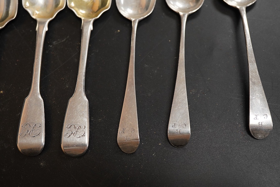 A pair of Edwardian silver Old English pattern sauce ladles, by Daniel & John Welby, London, 1901, 17.3cm, together with seven other items of silver flatware including a fiddle pattern table spoon, London, 1845 and a mot